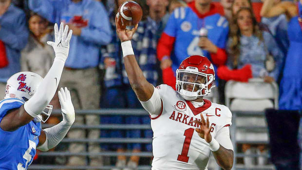Razorbacks quarterback KJ Jefferson throwing a pass against Ole Miss on Saturday night